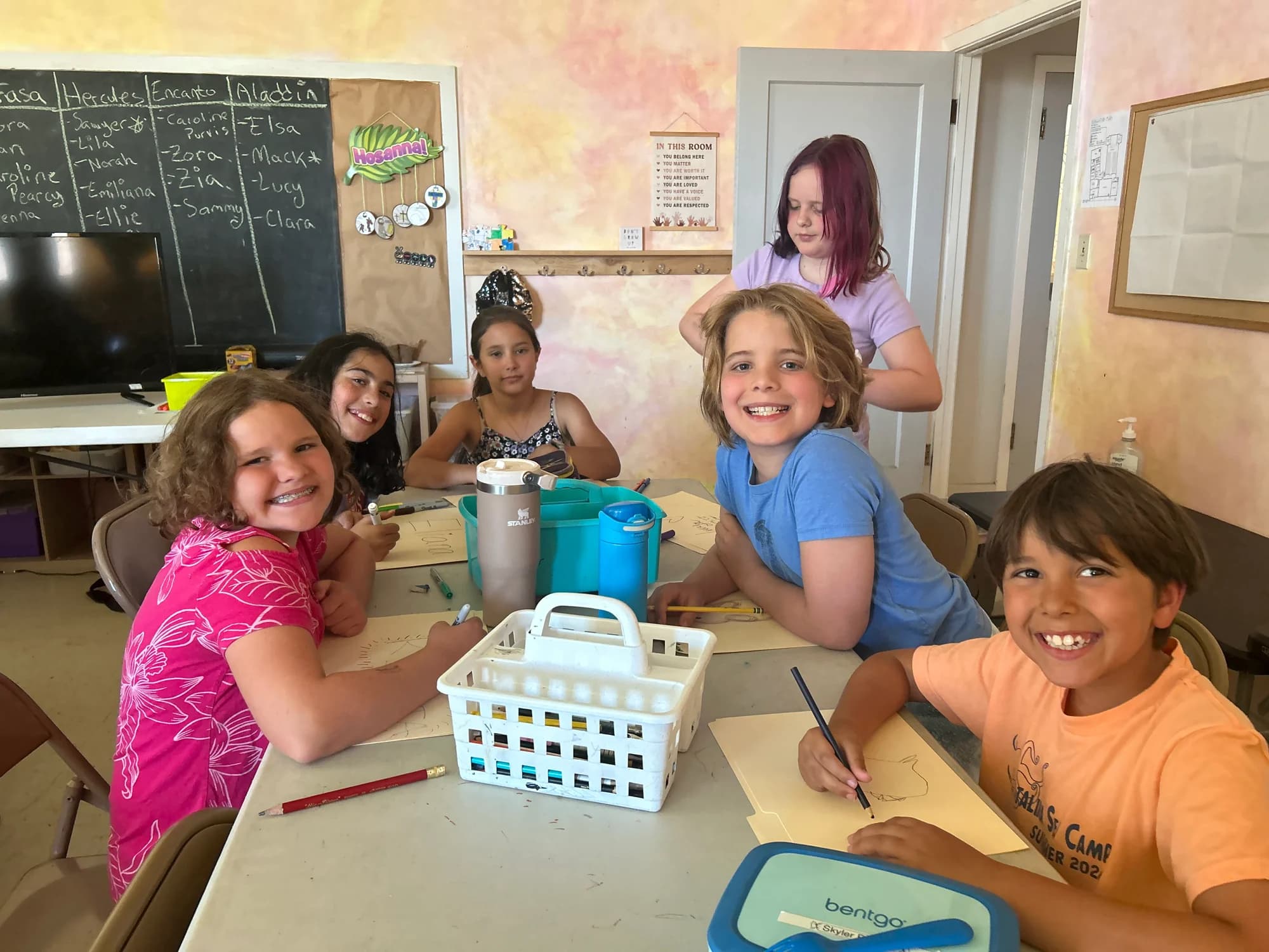NorCal Arts campers share their handmade project with a teaching artist