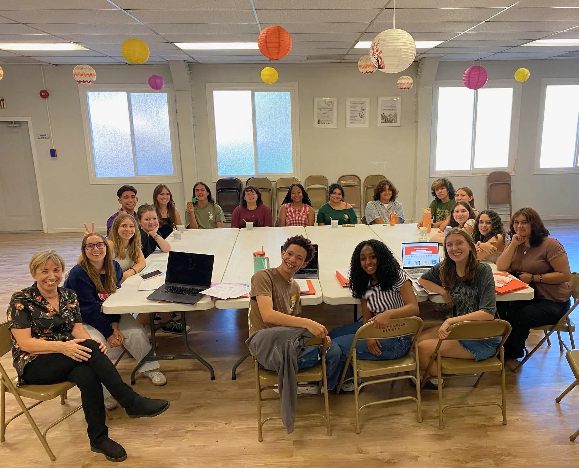 NorCal Arts students meet around a table for college and career guidance