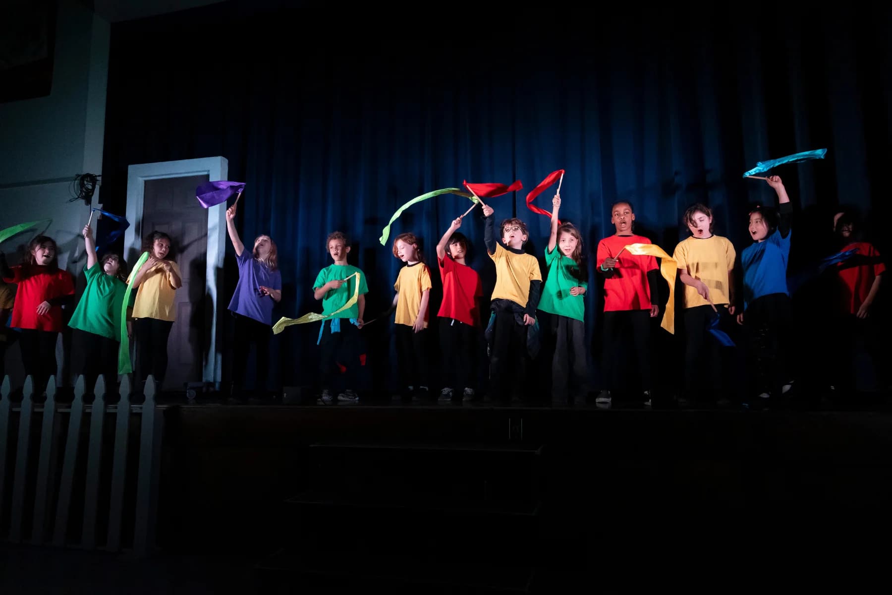 Students celebrating together on a NorCal Arts stage
