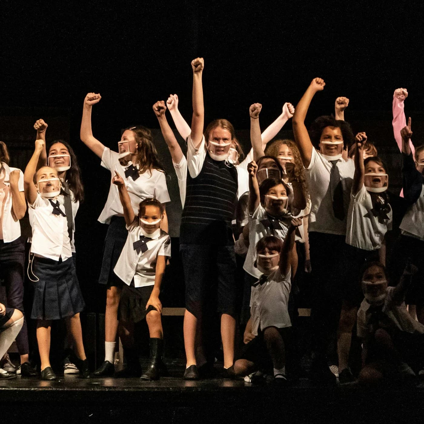 A NorCal Arts ensemble celebrating together on stage